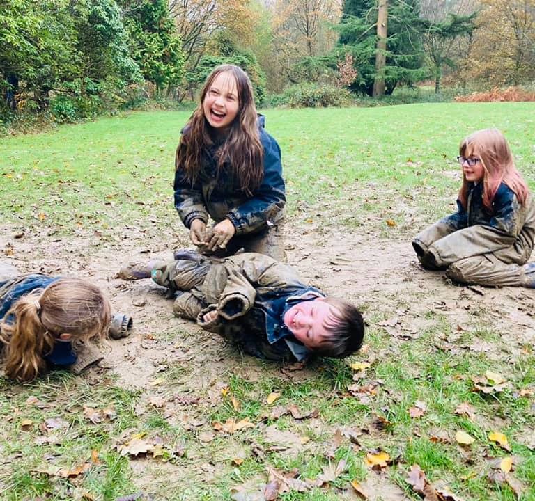 students in the mud