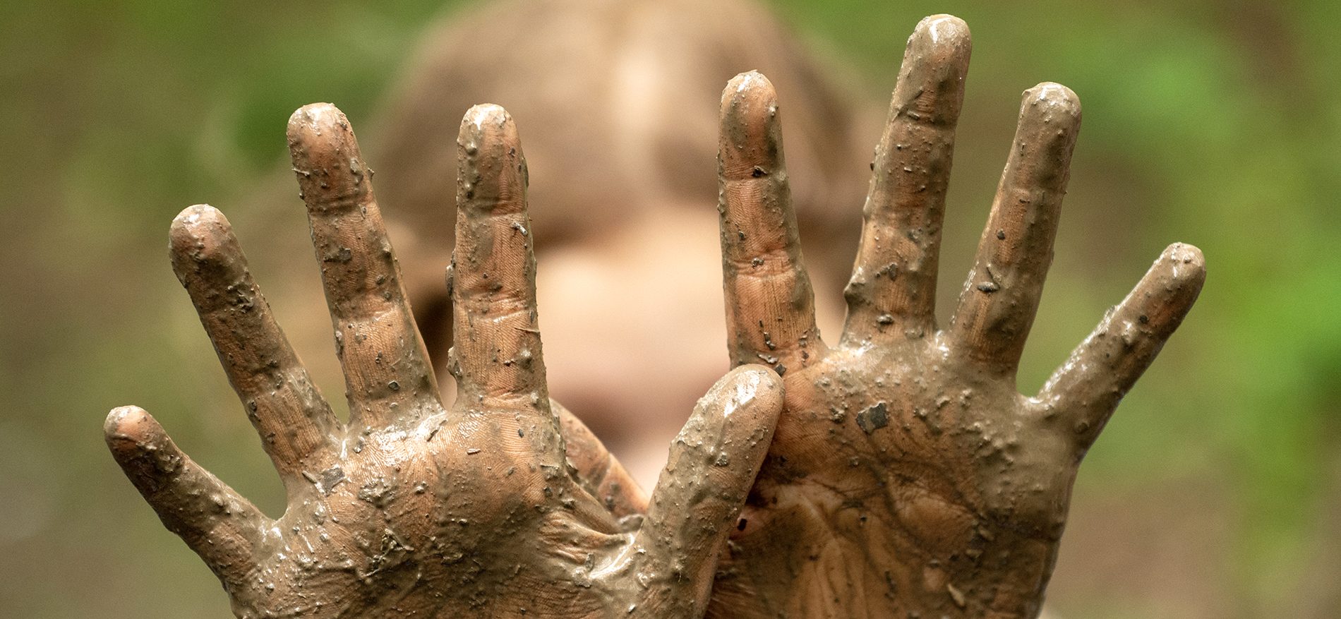 muddy hands