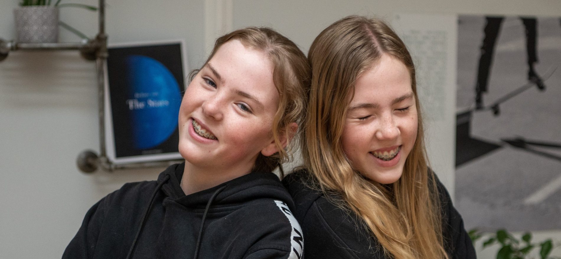 2 students smiling