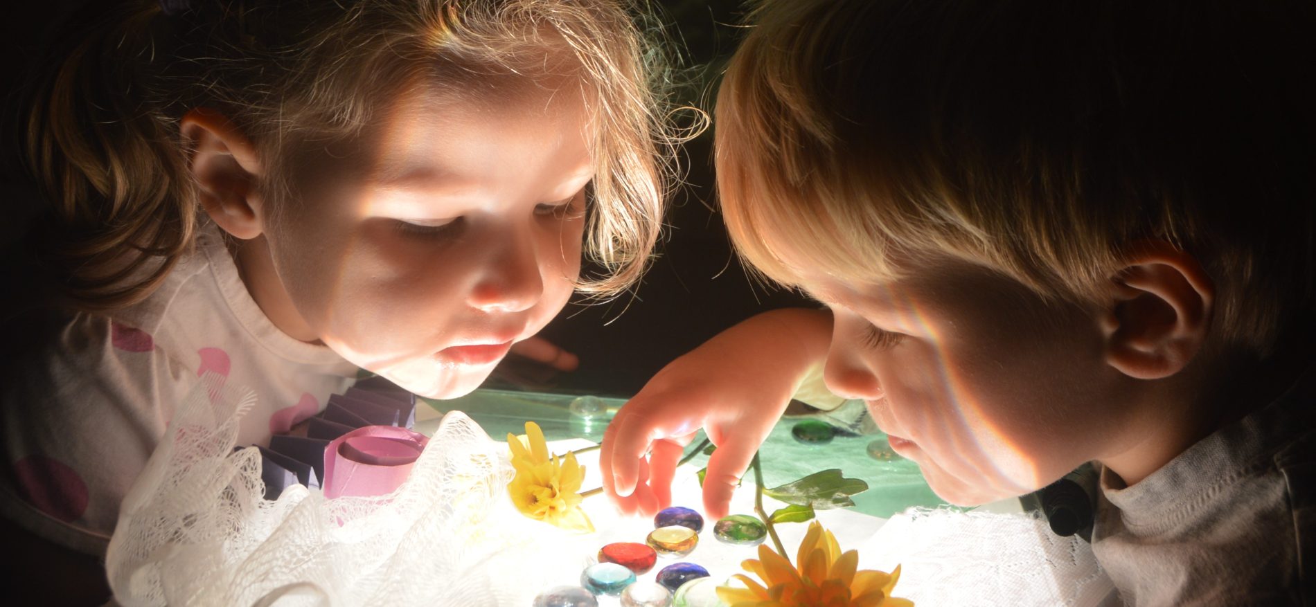 young children with marbles