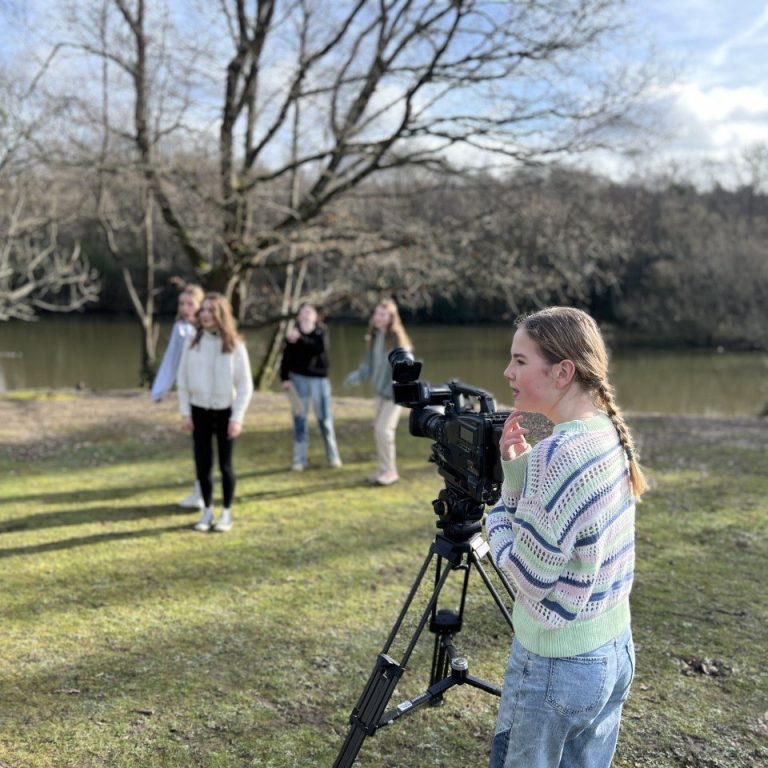 student using a camera