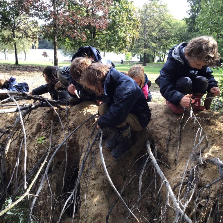 students on a mound