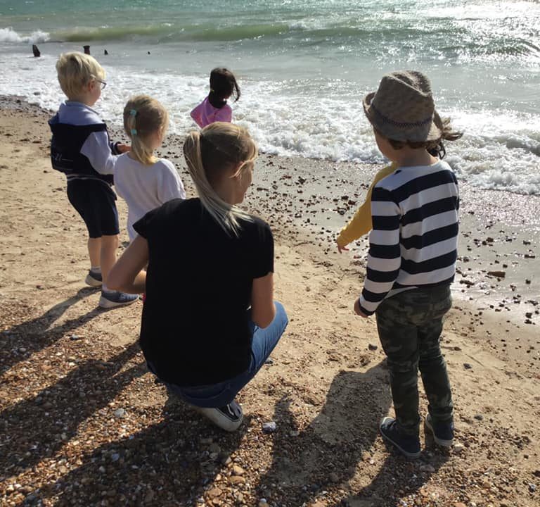 students at the beach