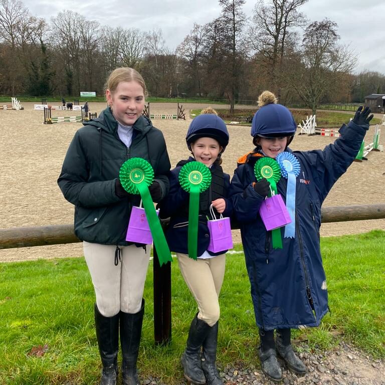 students with rosettes